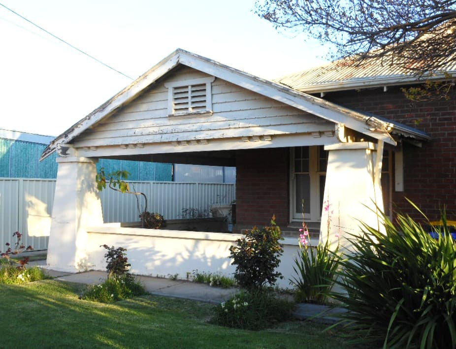 Asbestos walls, eaves and soffits — illustrative Australian housing or construction photograph, not proof of asbestos